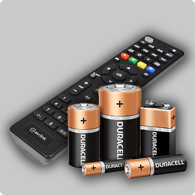 Hotel Room Essentials A set of different types of Duracell batteries and a remote control on a light grey background