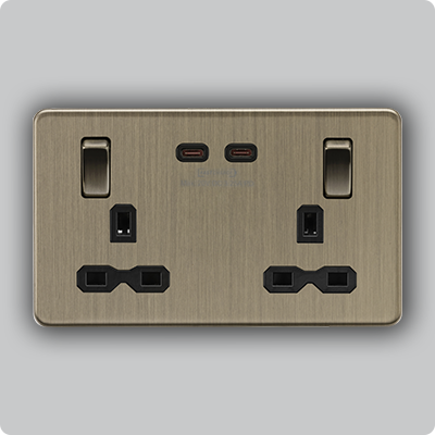 Wiring Accessories A brushed bronze socket with integrated USB on a grey background